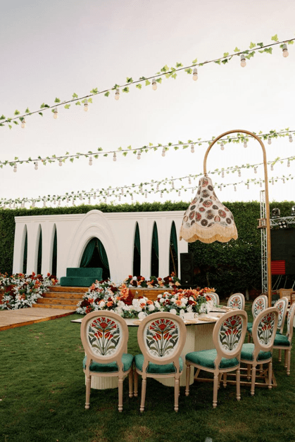 Candlelit dining under festoon lights