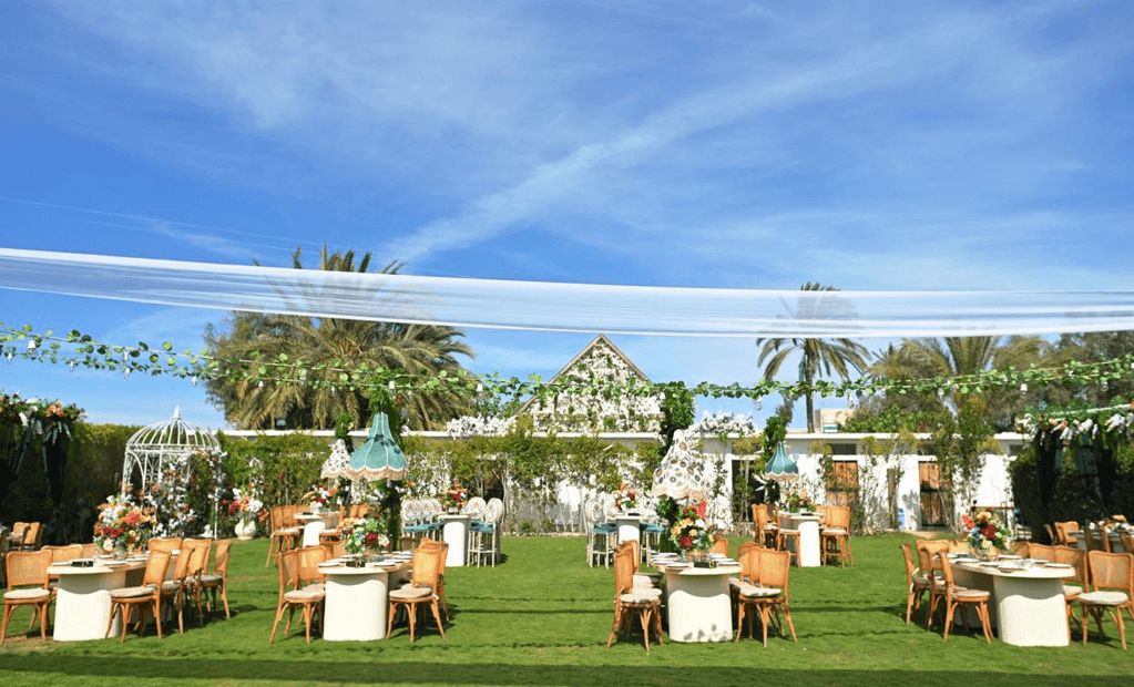 Open-air tables beneath the palms
